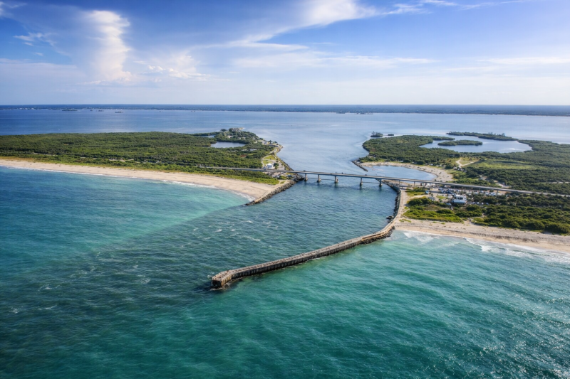 Aerial view of islands with a bridge and waterways.